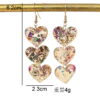 oly-84ee64a83f656ae2a988699f51aebca7 Wholesale acrylic sequins asymmetric heart-shaped triple love personality simple retro earrings earrings color