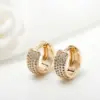 Wholesale Round Clip Earrings For Women With Bezel Setting, 14K Real Gold Plated Copper Featuring Zircon Inlay, Electroplated Finish