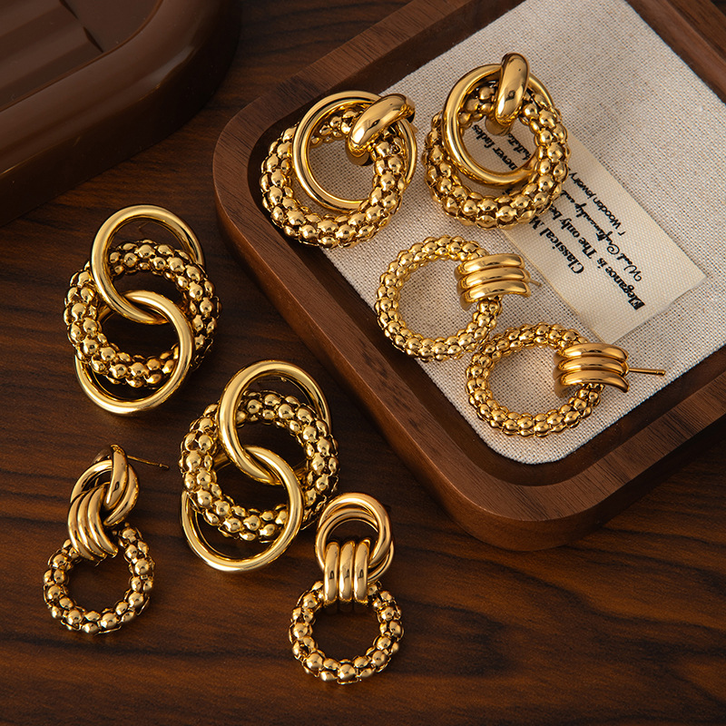 Wholesale European and American Cross-Border Titanium Steel Earrings Solid Glossy Earrings High-End Autumn and Winter Earrings Accessible Luxury Niche
