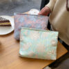 Wholesale retro embossed flower high quality cosmetic bag large capacity canvas bag female liner bag