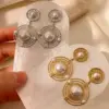Wholesale Drapey Micro Inlaid Pearl Zirconia Three-Dimensional Titanium Steel Vacuum Electroplated (Fired) Earrings