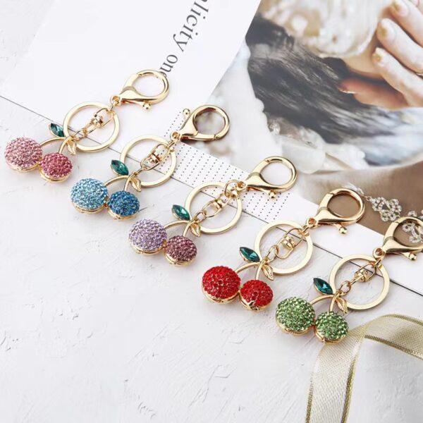 oly-8a9ae10fecd818fc067c1ec4b265bf6c Wholesale Creative alloy rhinestone fruit Cherry keychain female cute fashion exquisite bag key chain car pendant