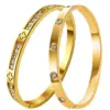 Wholesale Luxurious Rose Gold Oval Inlay Bangle For Women In Titanium Steel With Zircon Detailing
