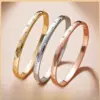 Wholesale Sparkly Gold Bangle In 18K Real Gold Plated Titanium Steel With Rhinestones, Featuring Electroplated Finish
