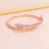 Wholesale Electroplated Copper Snake Pattern Bangle For Women With Zircon Inlay And Water Plating Process