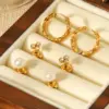 Wholesale 304 Stainless Steel Geometric PVD Coated Pearl Zircon 18K Real Gold Plated 18K Gold IG Style Casual Gold Ear Studs