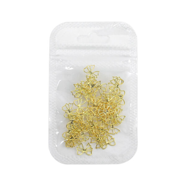 oly-8c3d396ca004904214e20e44cb8dcf46 Wholesale Popular Manicure Jewelry Gold and Silver Hollow Alloy Bow Tie Flash Light Luxury All-match Bow Manicure Nail Accessories