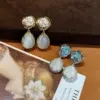 Wholesale Vintage Cat's Eye Stone Flower Waterdrop Earrings Versatile High-End S925 Earrings Geometric Pattern French Vintage Style Women's Jewelry