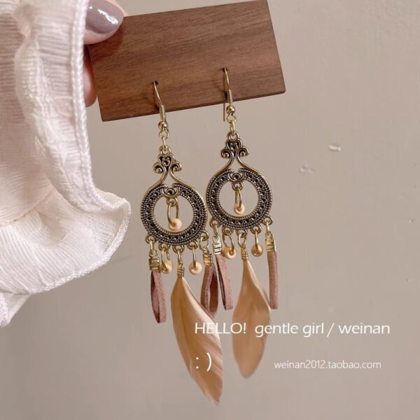 oly-8c6ceb3e6c60e70f2bf960f42a223ead Wholesale Ethnic Style Retro Feather Earrings Long Multi-Color Holiday Feather Earrings Beaded Design Circle Earrings