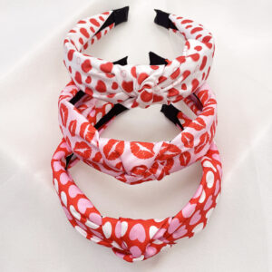 Wholesale 3 sets of cross-border independent station Valentine's Day love flowers Leopard fabric knotted hair band hair accessories holiday headband