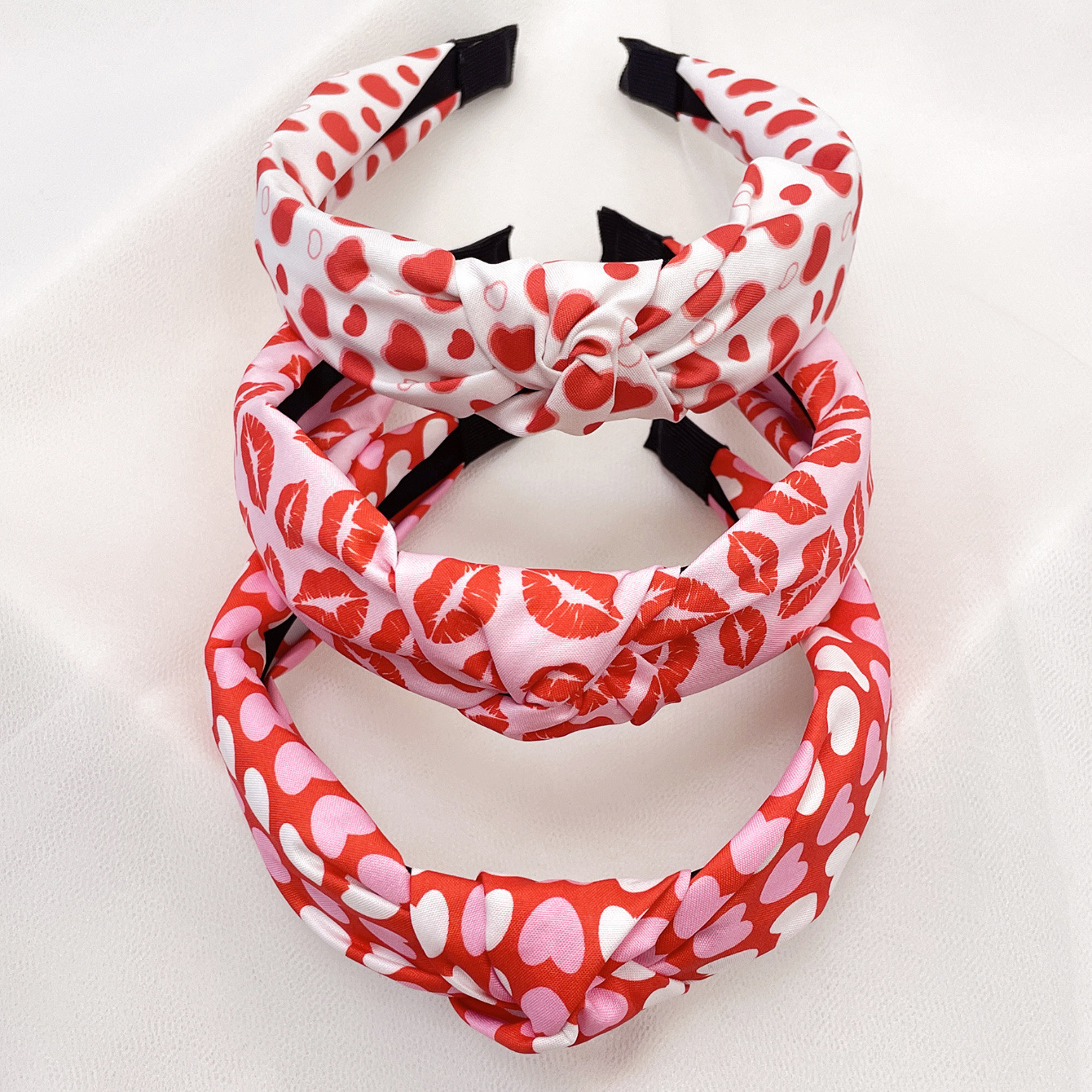 Wholesale 3 sets of cross-border independent station Valentine's Day love flowers Leopard fabric knotted hair band hair accessories holiday headband
