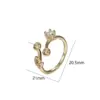 Wholesale Waterproof Non Tarnish Leaves Open Ring For Women In Copper With 14K Real Gold Plated Electroplated Finish And Zircon Inlay