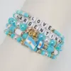 oly-8f0b4dc4a48f890a64decc70967f823e Wholesale Unisex National Flag Beaded Glass Bracelets In Bohemian Style