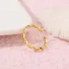 Wholesale Geometric Open Rings For Women In Copper With 14K Real Gold Plating And Red Zircon Inlay
