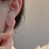oly-8ff22ecdb76d62f4003aa96616076f8a Wholesale Korean Style Explosions Romantic Love Shape Peach Powder Earrings Women's Style Fresh Sweet Simple Sweet Cool Super Flash Earrings Trendy