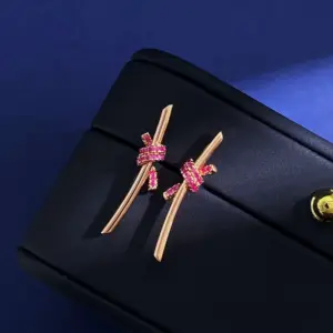 Wholesale Women’s Knot Stud Earrings With Claw Setting, 18K Real Gold Plated Brass Featuring Zircon, Water Plating Finish