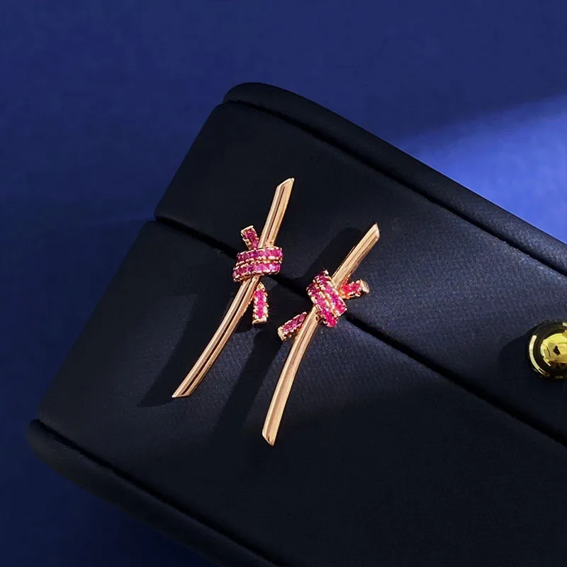 Wholesale Women’s Knot Stud Earrings With Claw Setting, 18K Real Gold Plated Brass Featuring Zircon, Water Plating Finish