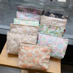 Wholesale retro embossed flower high quality cosmetic bag large capacity canvas bag female liner bag