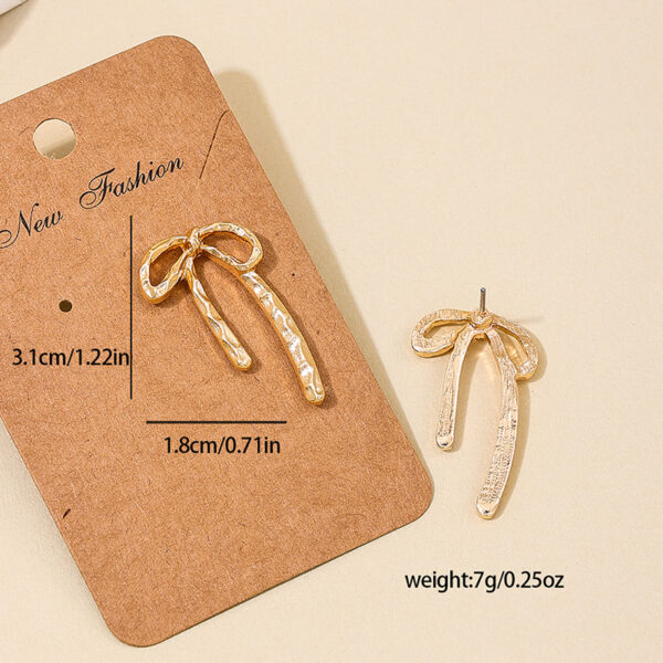 Wholesale 1 Pair Ig Metal Style Simple Spring and Summer Earrings Hollow Bow Women Commuter Earrings Earrings Stud