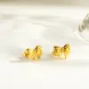Wholesale Asymmetrical Bow Tie Stud Earrings For Women In 304 Stainless Steel With 18K Real Gold PVD Coated Plating And 0.03µm Thickness