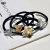 Wholesale Designer hair band Korean style French jewelry pearl headdress metal hair rope hair accessories niche light luxury hair rope