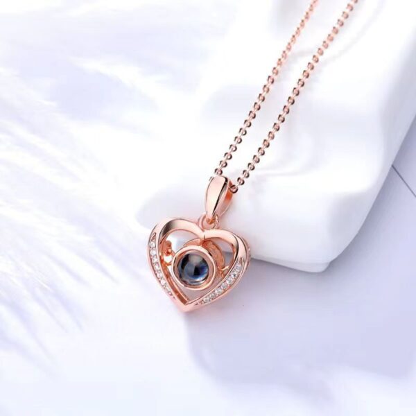oly-9419e5930c57fa40b2906884526f1512 Wholesale 100 languages projection necklace Valentine's Day gift heart-shaped pendant beating heart heart-shaped smart necklace