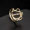 Wholesale Women’s Flowers Ring In Copper With Golden Electroplated Finish Featuring Gem Inlay