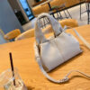oly-967f5bb02e7fd370940ccf2169b0b61f Wholesale French Niche Brand Versatile Pure Color Lunch Box Bag Fashion Handbag Single Shoulder Crossbody Bag for Women