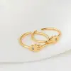 Wholesale Women’s Star Ring In Copper With 14K Real Gold Electroplated Finish Featuring Moissanite Inlay