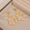 Wholesale Imitation Gold Plated 304 Stainless Steel Water Plated Artificial Gemstone Water Drop Hollow Vacuum Electroplated Waterproof Non-Fading Earrings For Women