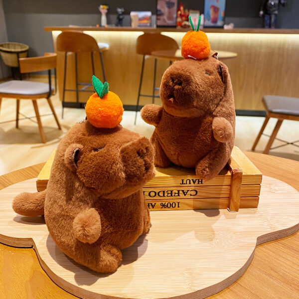 Wholesale Creative Cartoon Plush Persimmon Capibala Wagging Tail Keychain Capybara Doll Backpack Pendant Small Gift