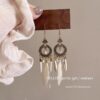 oly-9a1faeebccc890205e5edf703c27000b Wholesale Ethnic Style Retro Feather Earrings Long Multi-Color Holiday Feather Earrings Beaded Design Circle Earrings