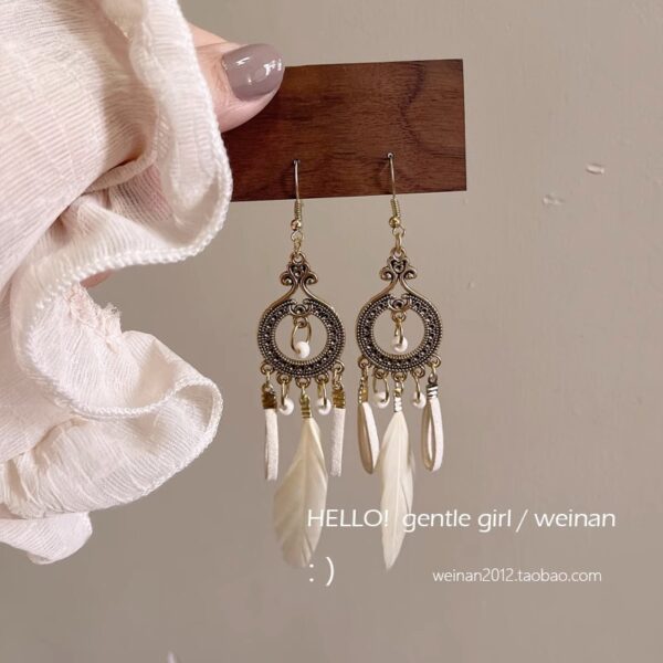 oly-9a1faeebccc890205e5edf703c27000b Wholesale Ethnic Style Retro Feather Earrings Long Multi-Color Holiday Feather Earrings Beaded Design Circle Earrings