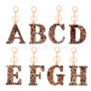oly-9a589303903f4a900ba4b5f8e7e8a597 Wholesale Acrylic leopard print letter keychain 26 letters complete creative fashion jewelry transparent pendant gift
