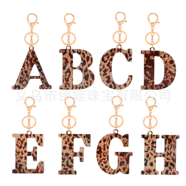 oly-9a589303903f4a900ba4b5f8e7e8a597 Wholesale Acrylic leopard print letter keychain 26 letters complete creative fashion jewelry transparent pendant gift