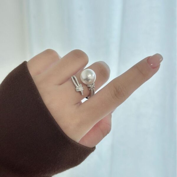 oly-9af753ec2d34c12dcc84030659d72f84 Wholesale S925 Silver Heavy Industry Full Diamond Winding Australian White Single Pearl Ring Women's Noble High-end Light Luxury Open Ring