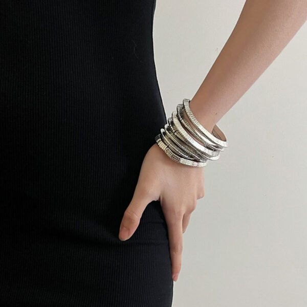 oly-9b5bf96879496dfcf2e476a36b2d5fd9 Wholesale Light Luxury Multi-layer Gold and Silver Stacked Stretch Bracelet Women's Niche High-end Retro Bracelet Autumn and Winter Hand