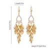 Wholesale Women’s Real Gold Plated Copper Tassel Grain Drop Earrings Featuring Elegant Design