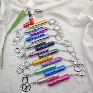 Wholesale Perfume sub-bottling portable travel sub-bottling bottle bottom filling pump 5ml high color value sample key chain perfume bottle