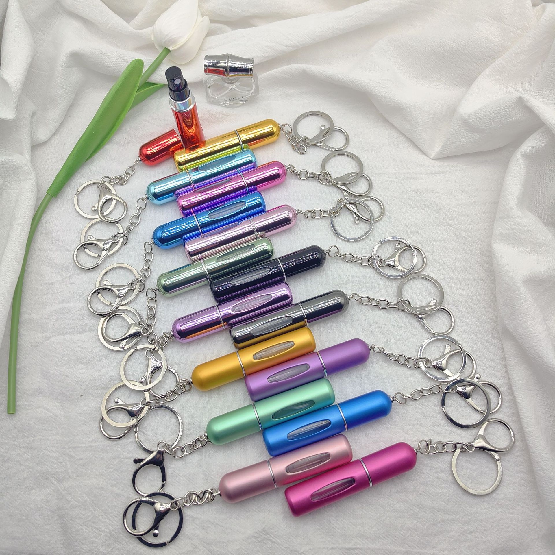 Wholesale Perfume sub-bottling portable travel sub-bottling bottle bottom filling pump 5ml high color value sample key chain perfume bottle
