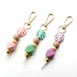 oly-9dcb361da7e35ee6bc78abbfeb19c0e9 Wholesale Cartoon Flower Hangers Creative Color Silicone Beaded Bracelet Jewelry Women's Bag Pendant Keychain