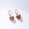 oly-9e05f2d958e754cad78c91412e89c5f3 Wholesale selling earrings temperament micro-inlaid zircon earrings female simple color diamond windmill earrings