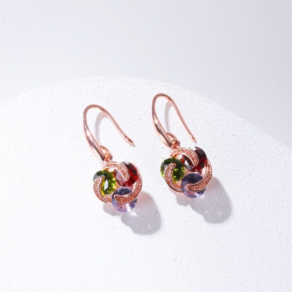 oly-9e05f2d958e754cad78c91412e89c5f3 Wholesale selling earrings temperament micro-inlaid zircon earrings female simple color diamond windmill earrings