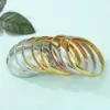 Wholesale PVD Coated 18K Gold Plated Round Stainless Steel Simple Style Waterproof Non Tarnish 304 Stainless Steel Bangle