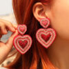 oly-9f3490c20e55e744f9de1f3d0004b106 Wholesale hand-woven beaded love earrings earrings romantic heart-shaped high-quality beaded red earrings