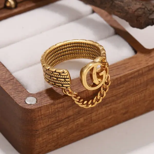 Wholesale Three-dimensional Letter Open Ring For Women In Copper With Golden Plated UV Plating And 0.03µm Thickness