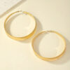 oly-a0f51c15b2ac6c053a4b84d9b1a57ba0 Wholesale golden circle shape plain ring flat earrings retro personality exaggerated simple design earrings