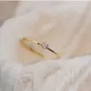Wholesale Waterproof Non Tarnish 304 Stainless Steel Band Ring With Zircon Inlay, Unisex, Available In Gold