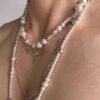 oly-a1b6e76054359d9a786a8f0f2108b8b4 Wholesale Niche cross sweater chain irregular size pearl beaded long necklace various ways to wear clavicle chain female