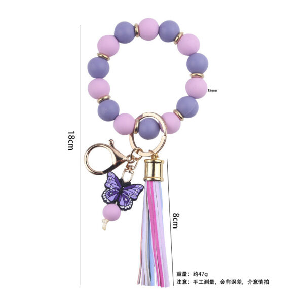 oly-a1de998296fe8307004885077d7a071d Wholesale Creative DIY Beaded Cartoon Butterfly Wrist Keychain Pendant Rainbow Leather PU Tassel Ring Key Ring Accessories